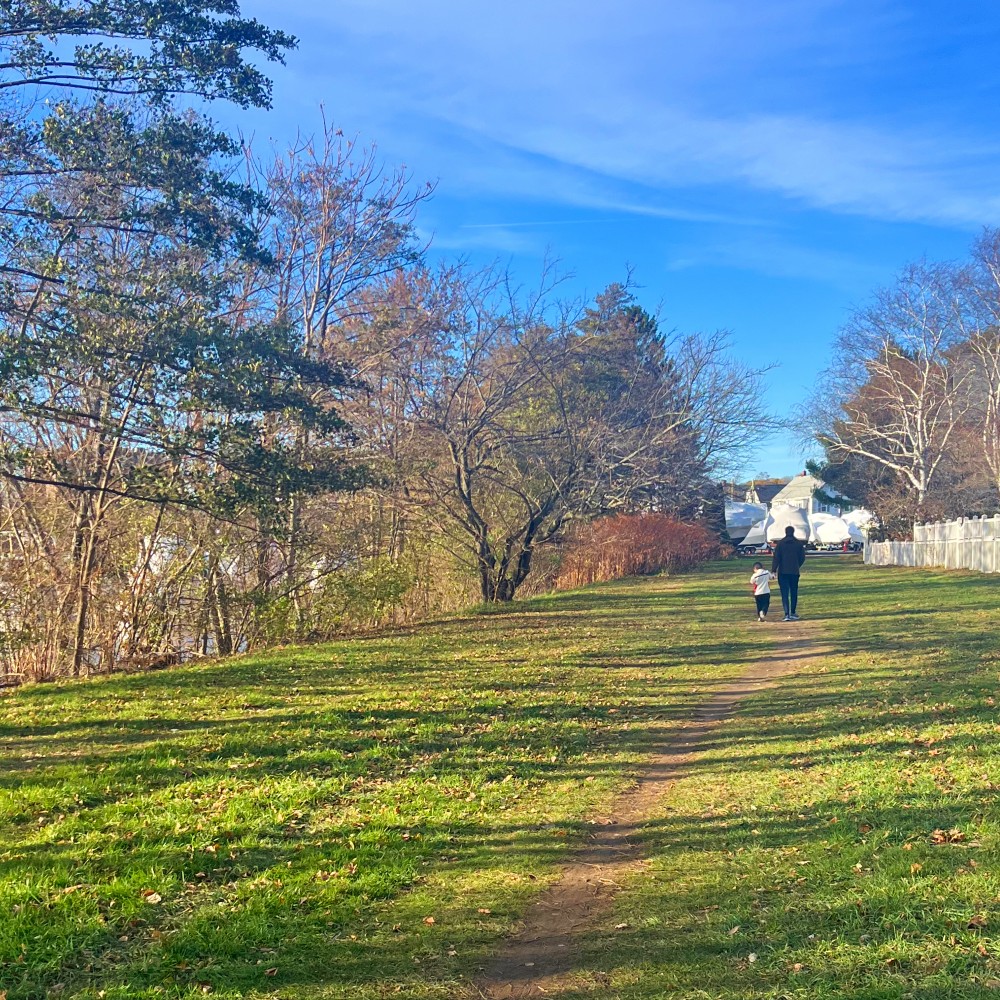 N and my husband walking on the "secret path" back home.